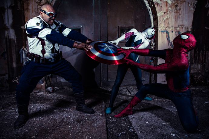 Character photo of a dramatic three-way fight scene with a round shield in a dim courtyard